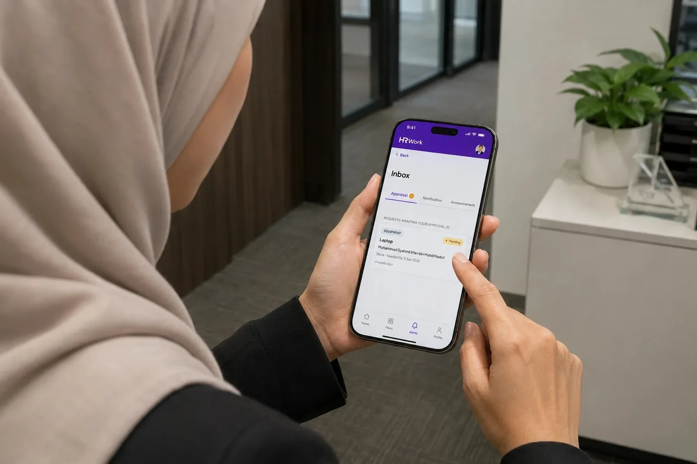 The HRWork approvals inbox open on a phone, showing an equipment request waiting for a decision.